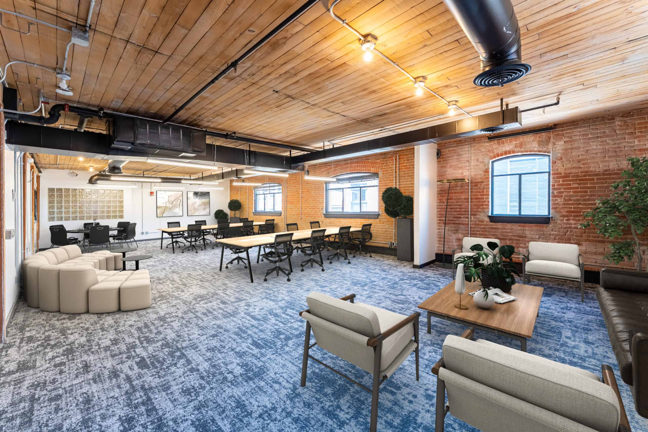 Wood-paneled reception with leather lounge chairs